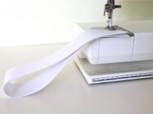 Preparing an elastic band for a half-skirt belt