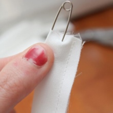 Turning the stitched strip