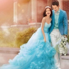 Blue wedding dress with a groom's outfit