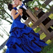 Wedding dress in blue with a groom's outfit