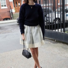 White organza skirt combined with a sweatshirt