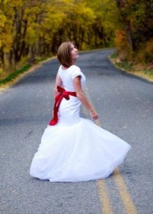Short wedding dress with a burgundy belt