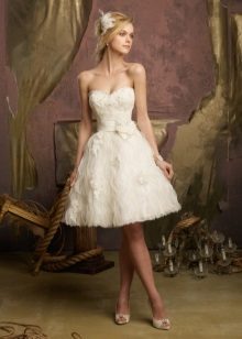Short wedding dress with a decorated skirt