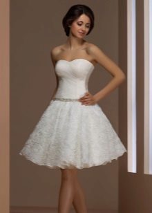Short wedding dress with flowers on a skirt