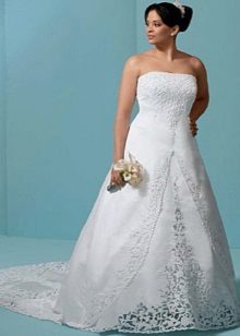 Wedding dress with a train and lace for a full bride