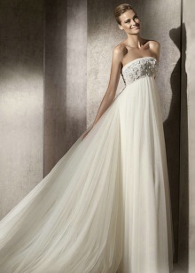 Empire style wedding dress decorated with rhinestones and stones