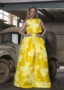 Evening yellow suit with a top and a skirt