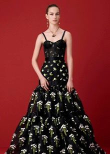 Black evening dress with a green pattern