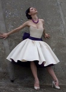 Short puffy wedding dress with a blue belt