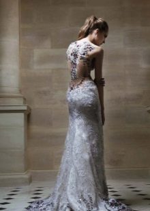 A gray evening dress with the illusion of a neckline