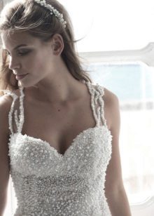 Wedding dress with pearls on a corset