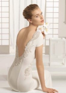 Wedding dress with a decor on the neckline back to match the dress