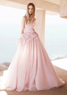 The wedding dress is pale pink