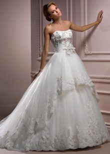 Wedding dress with a flower on a belt