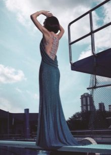 Sexy evening dress with a train and an open back