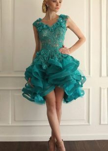 A fluffy short lace dress in turquoise color