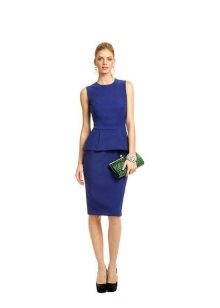 Green clutch to a dark blue dress
