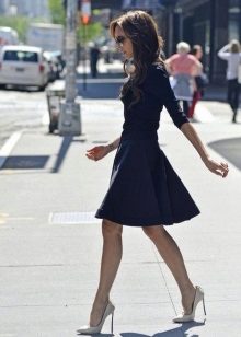 Navy dress with a full skirt of medium length