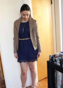 Navy lace dress in combination with a beige leather jacket