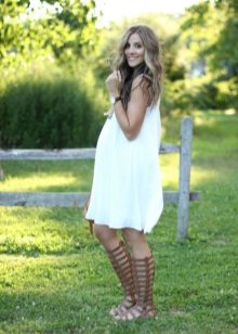 White dress in a cold shade for pregnant women