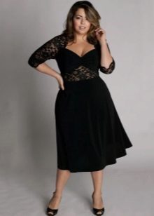 Black dress for the full combined of two fabrics: tight knitwear and guipure
