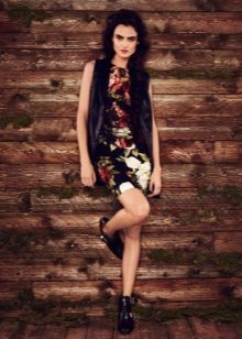 Colored dress with a leather vest