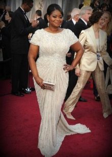 The correct style and type of dress that hide the belly