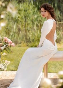 White floor-length dress with an open back