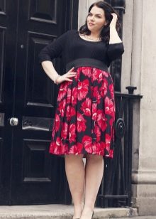 High-waisted dress with black top and red floral print skirt for overweight women