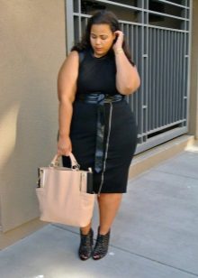 Large beige bag under the black office dress for overweight