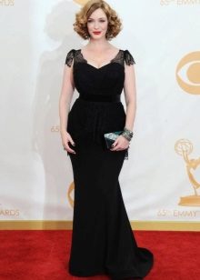 Long black dress with peplum and sleeves with wings