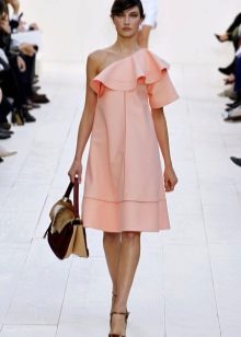 Light coral dress with frills on one shoulder