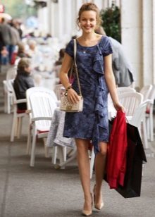 Dress with a frontal flounce