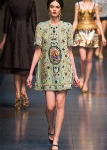 Green tunic dress at a fashion show