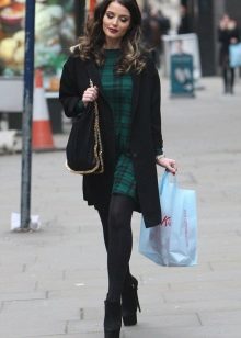 Dress in a dark green plaid (tartan) in a combination with a black coat and Louboutin