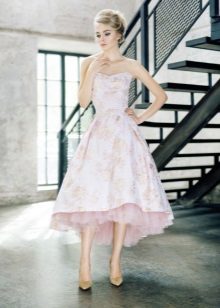 Short front long back dress in style