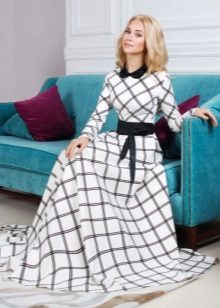 Long white check dress with a black collar and belt