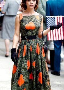 Dress in the style of the 50s with a belt and gloves