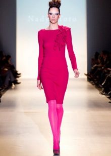 Colored tights under a knitted dress