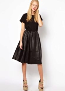 Dress with a knitted top and a leather skirt