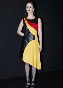 Asymmetric leather dress in black and yellow