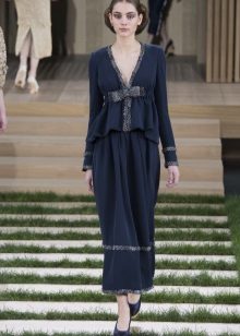 Autumn evening dress with a deep neckline