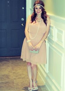 Decoration for a dress with a low waist in the style of the 20s