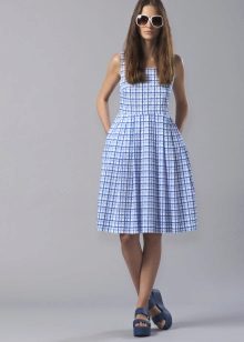 A fitted flared check dress