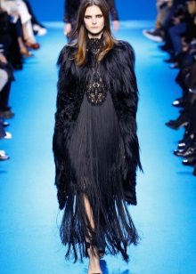 Fur cape under a winter dress