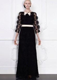 Black lace dress with a white belt