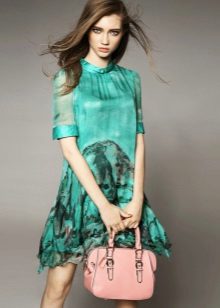 Green dress with a peach bag