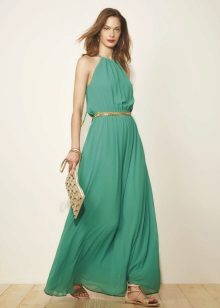 Green light dress with golden accessories