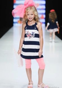 Knitted summer dress tunic for a girl with stripes