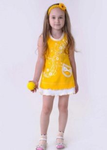 Knitted summer dress for the girl yellow